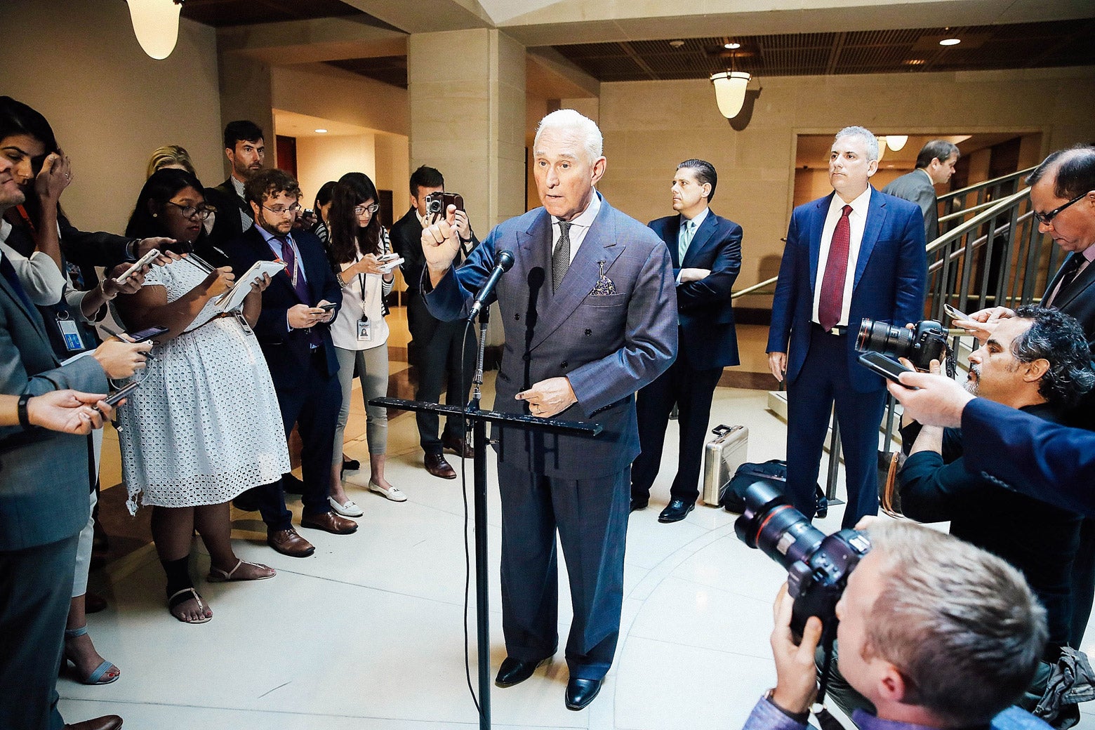 Roger Stone, former confidant to President Trump, speaks to the media after appearing before the House Intelligence Committee during a closed hearing on Sept. 26, 2017.