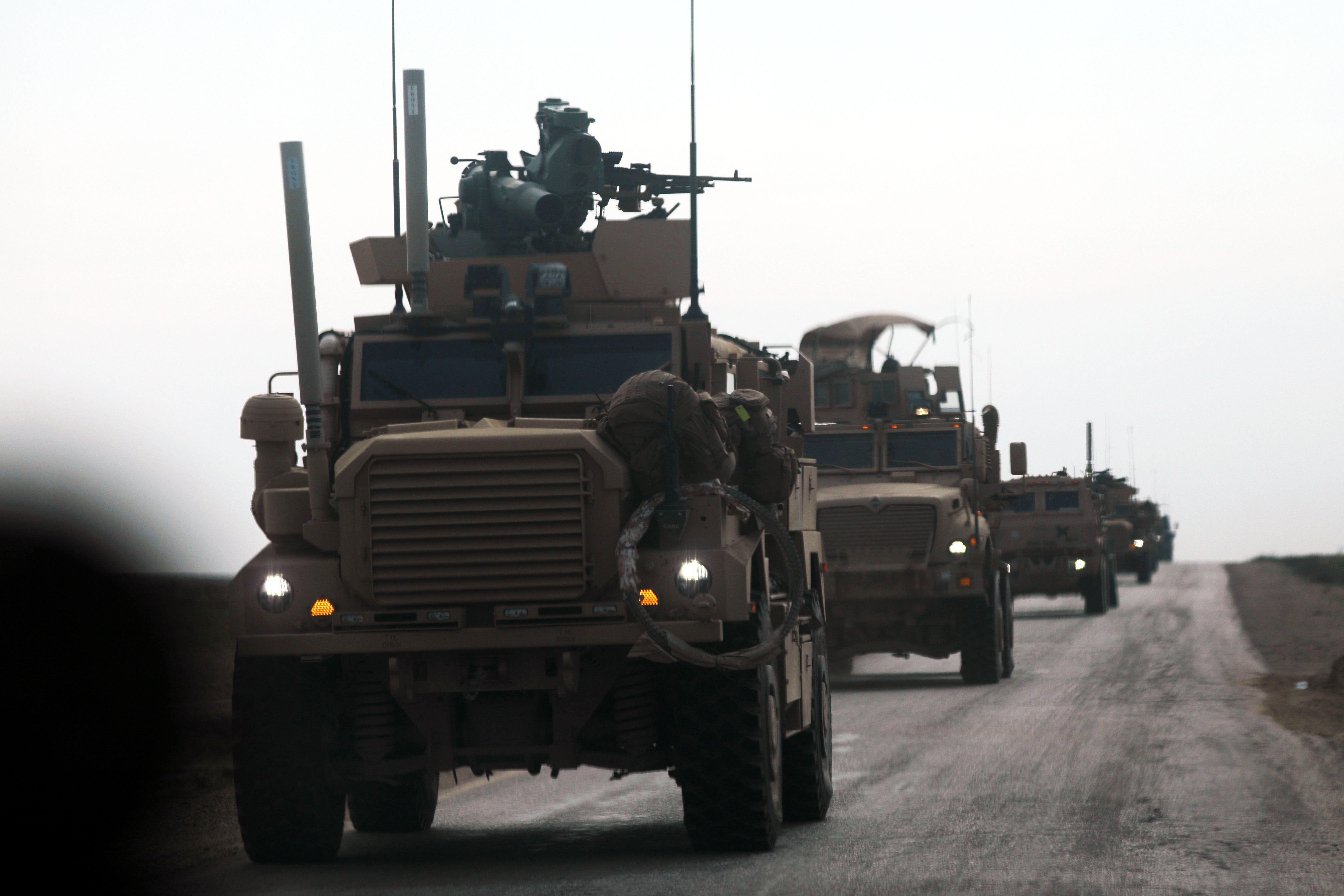 U.S.-backed coalition military vehicles during an operation to expel ISIS from the eastern Syrian province of Deir Ezzor on Feb. 21, 2019.
