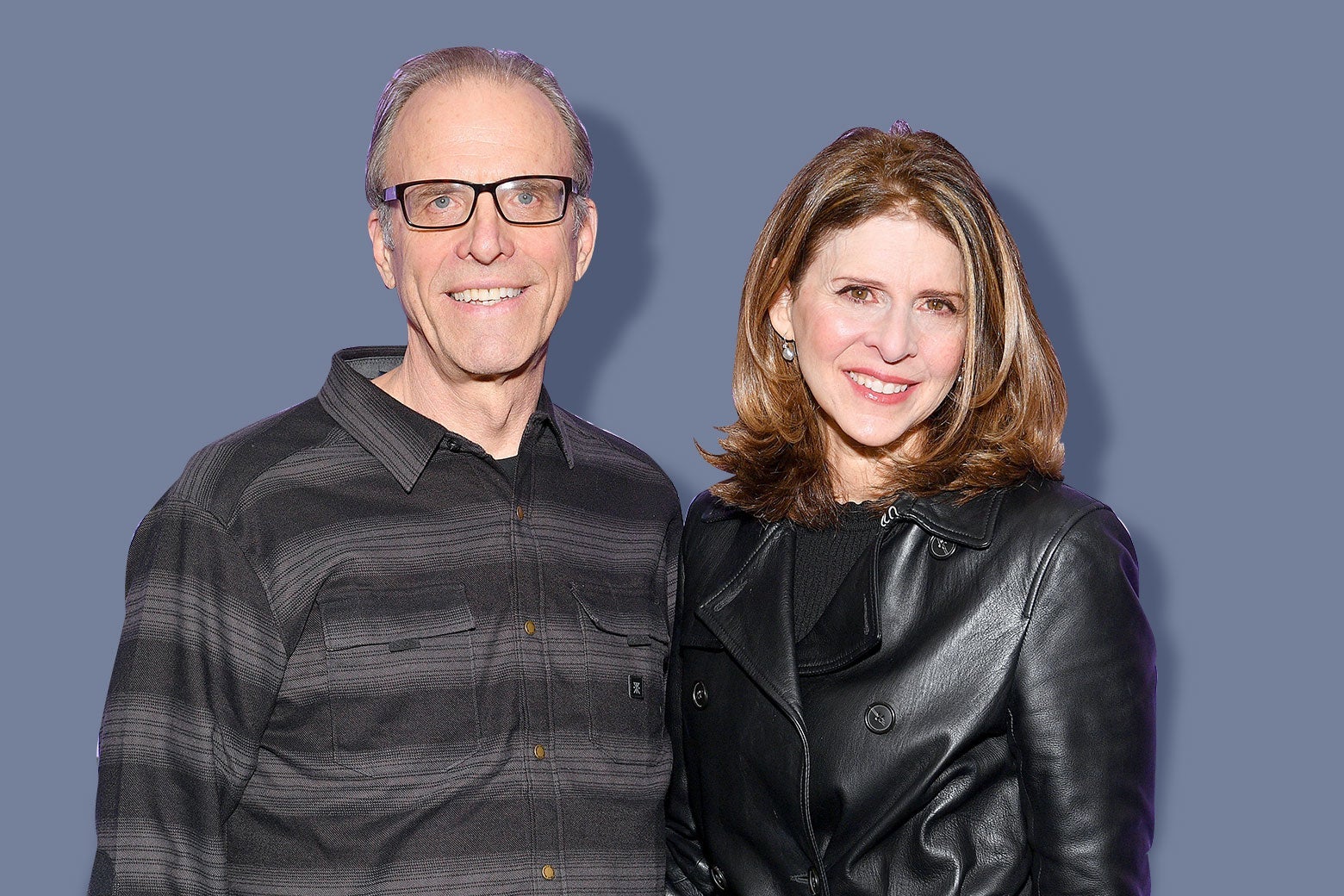 A white man and white woman standing side by side.