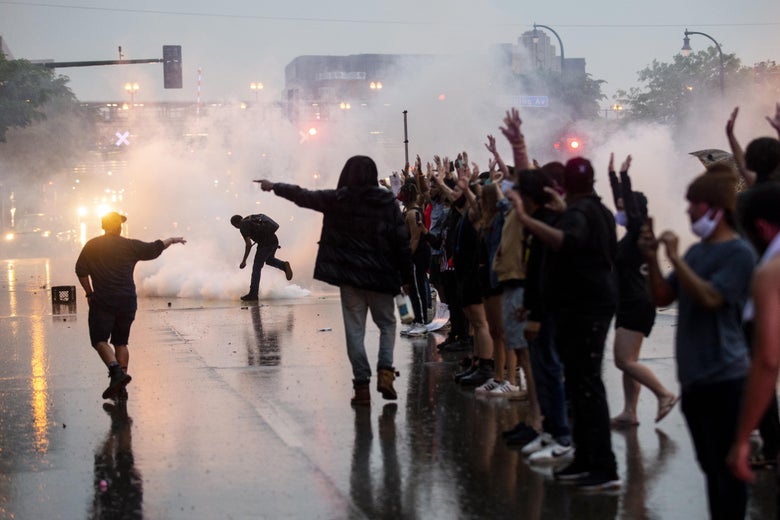 Minneapolis police clash with demonstrators protesting death of George Floyd.