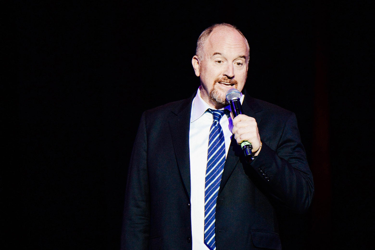 Louis C.K. doing stand-up.