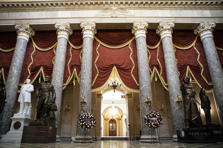 Flower wreathes that were used for a ceremony for Supreme Court Associate Justice Ruth Bader Ginsburg, sit in Statuary Hall of the U.S. Capitol on September 28, 2020 in Washington, D.C.