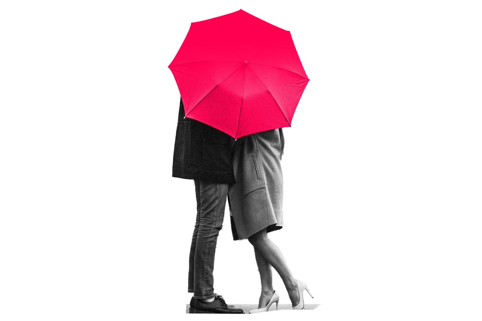 Two people kiss behind an umbrella.