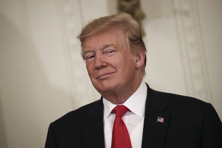 Donald Trump smirks.