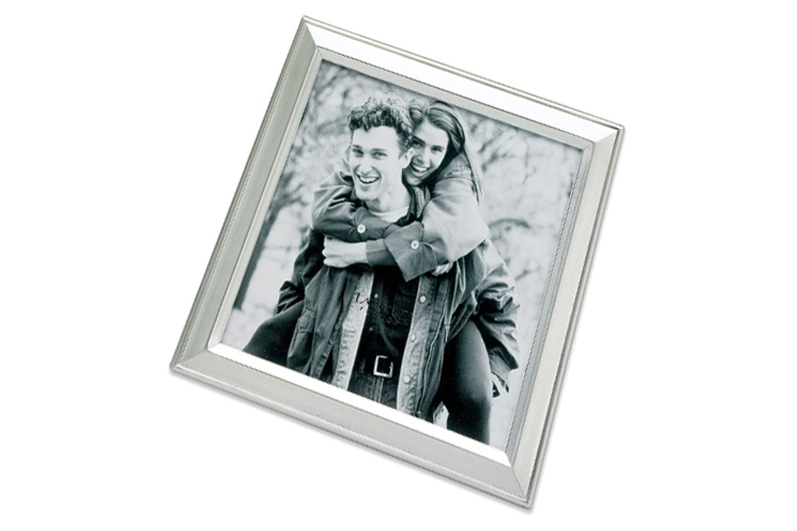 A silver photo frame with a black-and-white picture inside.