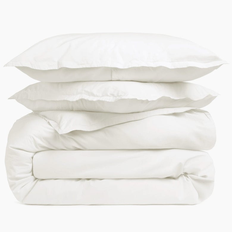 Folded duvet with two pillows stacked on top
