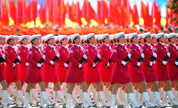 Chinese women militia march past Tiananmen 