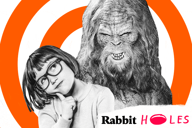 A young girl in glasses with Bigfoot behind her.