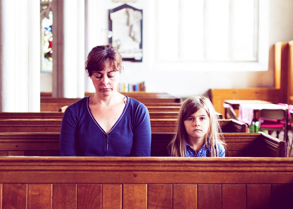 Mother and child in church.