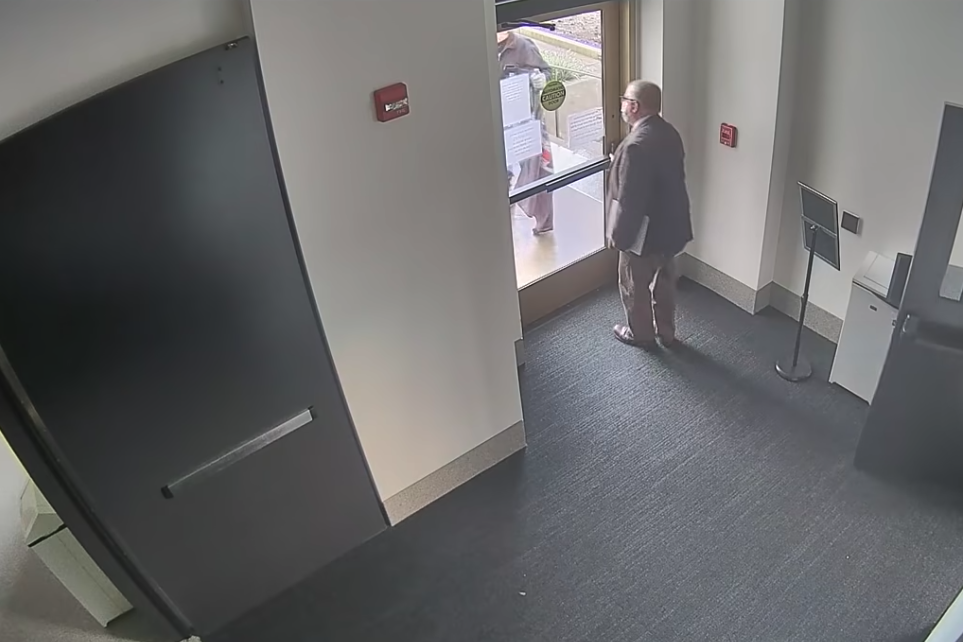 Surveillance video shows the moment State Rep. Mike Nearman opened the door and allowed protesters to enter the Oregon State Capitol on Dec. 21, 2020.