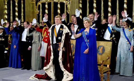 Dutch King Willem-Alexander is saluted by his wife Queen Maxima and guests during the religious crowning ceremony at the Nieuwe Kerk church in Amsterdam.
