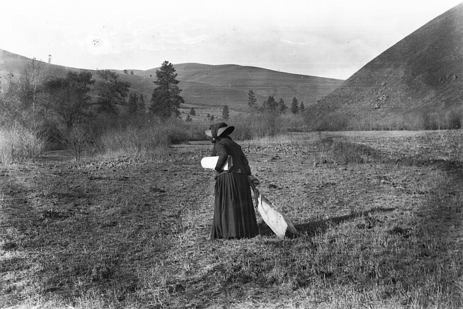 Alice Fletcher heading toward Washington with reports under her arm.