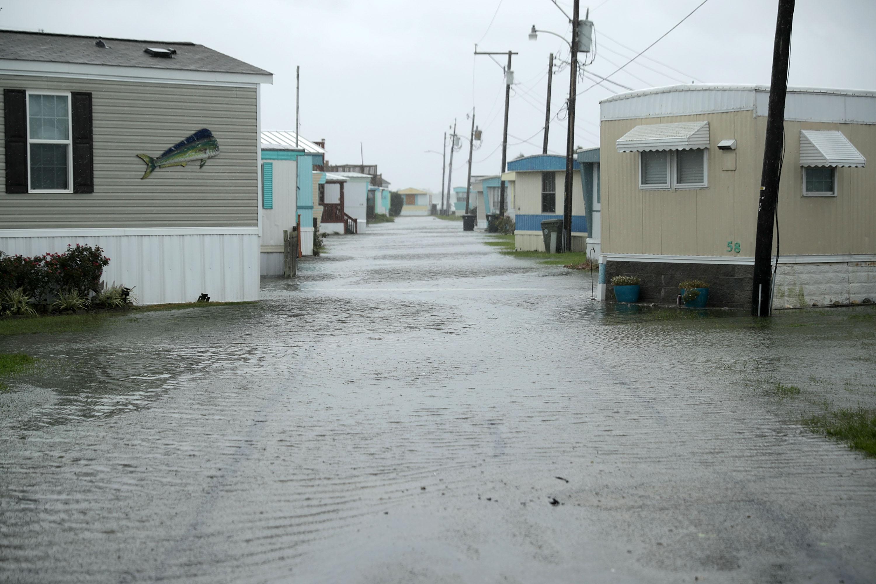 Flash flooding covers the road in low-lying areas in Atlantic Beach, N.C., as the outer edges of Hurricane Florence begin to affect the coast on Thursday.