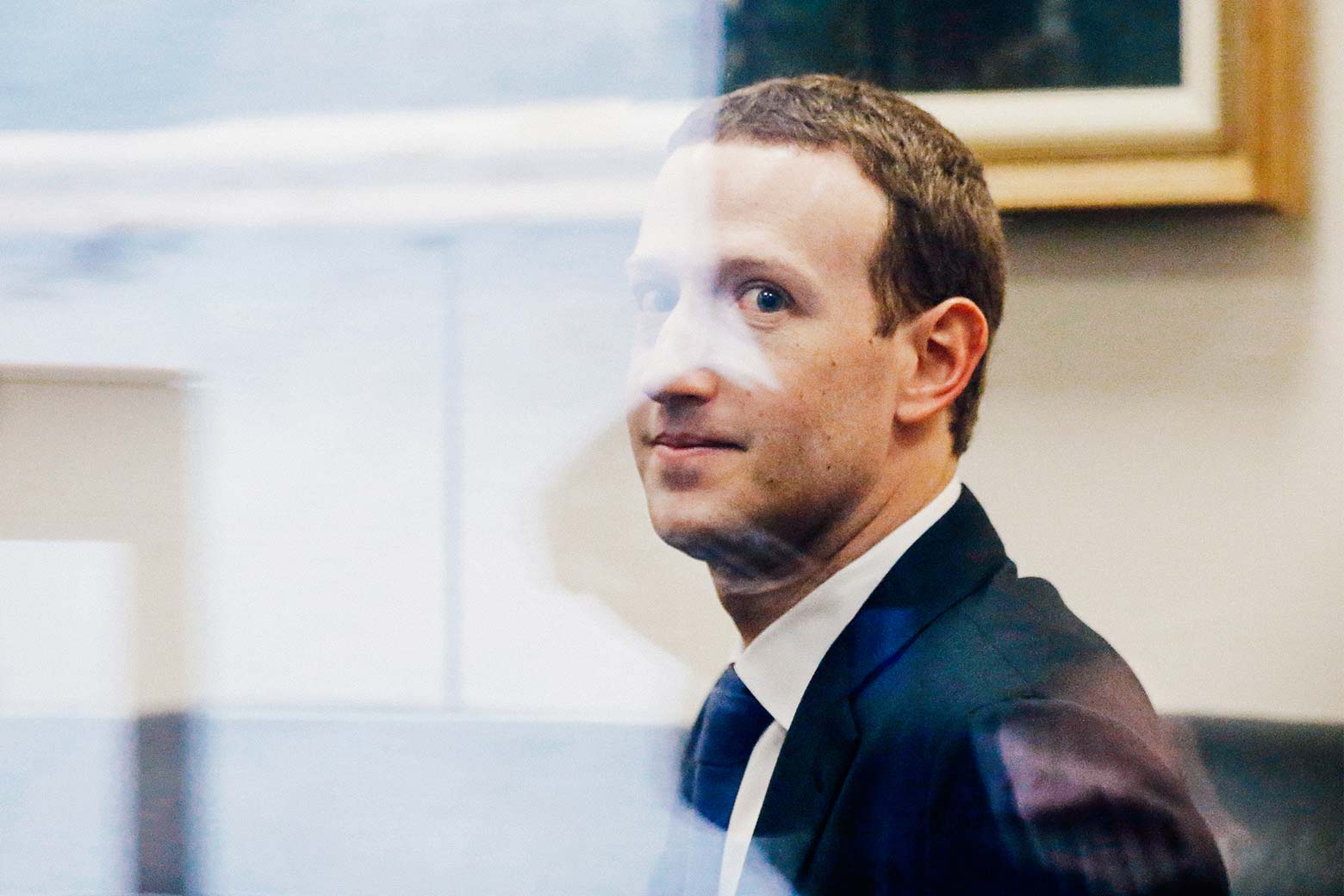 Facebook CEO Mark Zuckerberg sits in the office of Florida Sen. Bill Nelson on Monday in Washington.