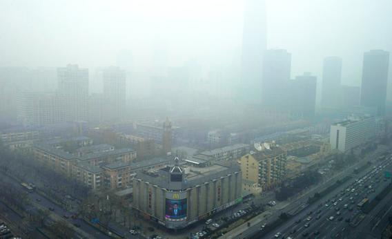 Skyscrapers are obscured by heavy haze in Beijing Sunday, Jan. 13, 2013.
