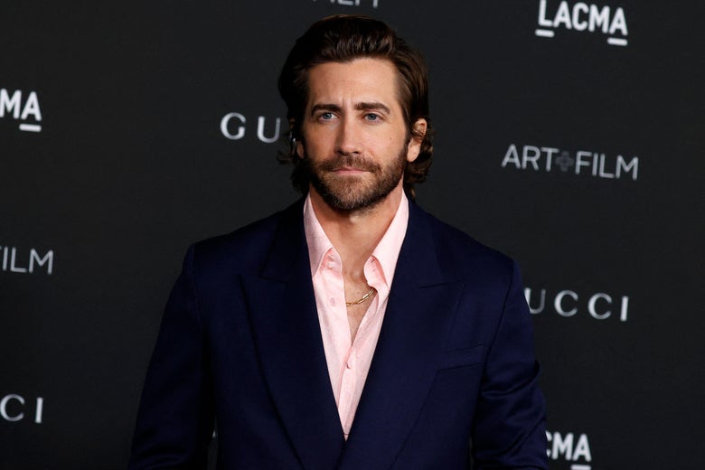 Gyllenhaal in a suit on a red carpet