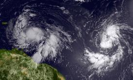 Isaac (left) reached tropical storm status and is approaching the Lesser Antilles islands as it moves westward on Aug. 22, 2012