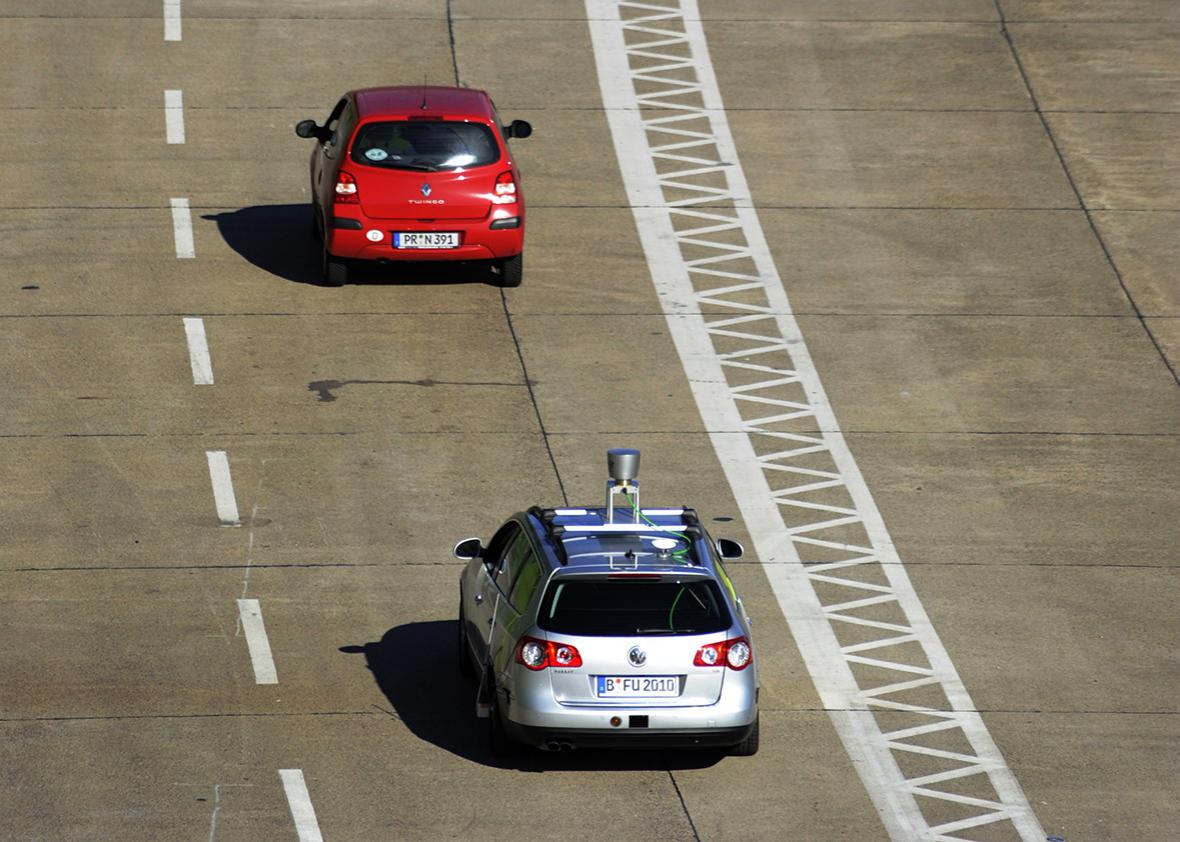The driver less car "Made in Germany" keeps a safe distance to the car in front as it is being put through its paces at Berlin's disused Tempelhof airport , October 13, 2010.