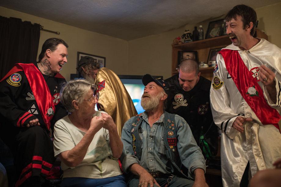Members of a Louisiana based Ku Klux Klan realm joke around at the home of one of their Imperial officers.
