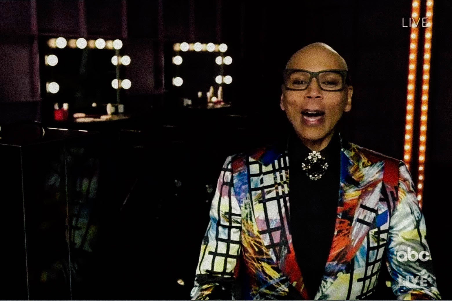 RuPaul Charles accepts at award at the Emmy Awards.