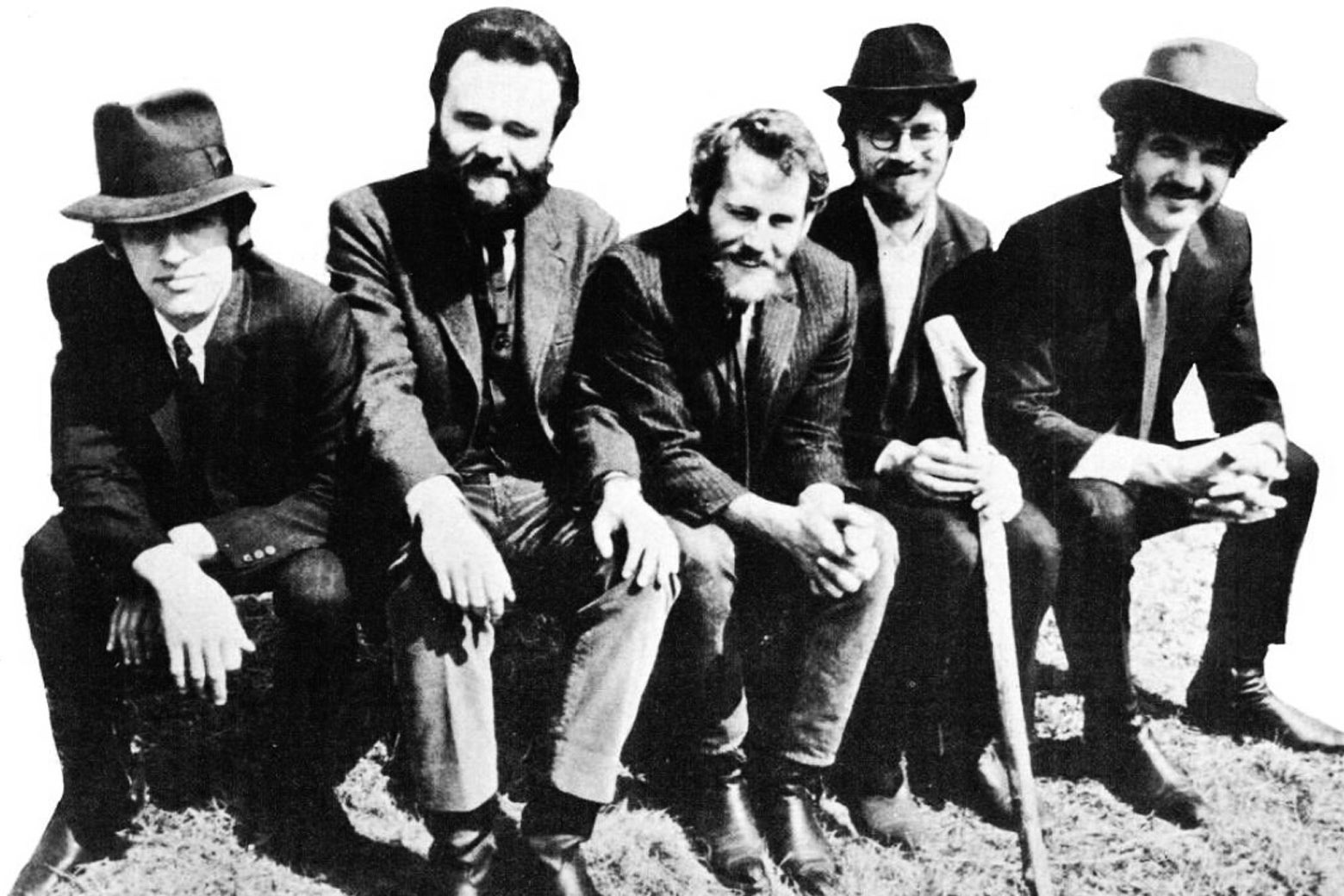 Black-and-white photo of the Band in old-timey clothes