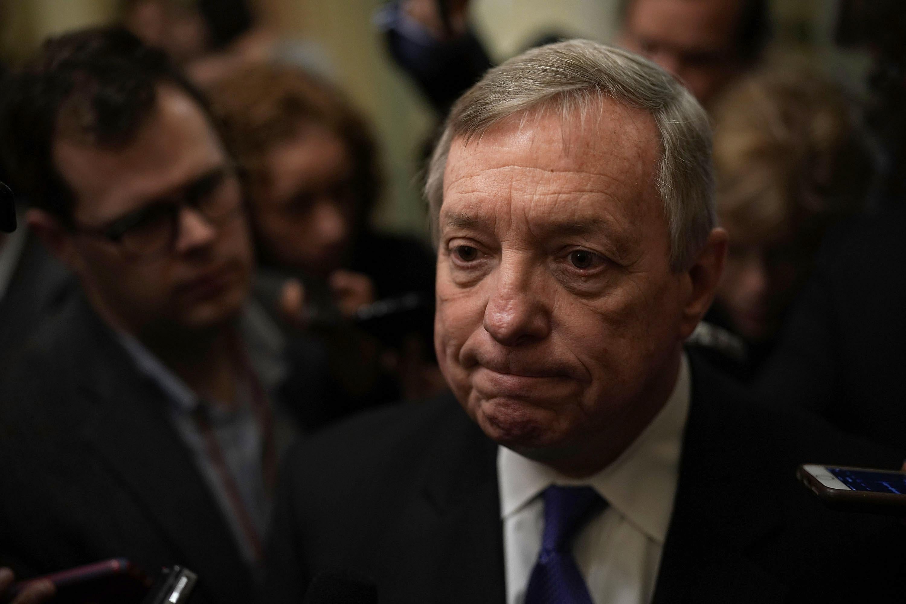 Senate Minority Whip Sen. Dick Durbin speaks to members of the media on Jan. 23 in Washington.