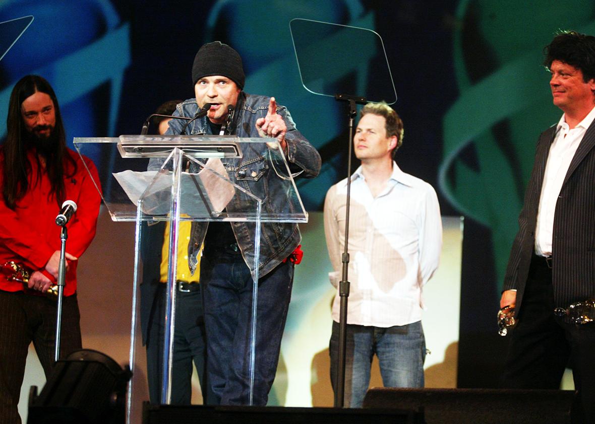 Gord Downie, lead singer of the band The Tragically Hip, accepts their Juno as the newest inductees into Canada's Music Hall of Fame during the Juno Awards Dinner and Gala on April 2, 2005 in Winnipeg, Canada.