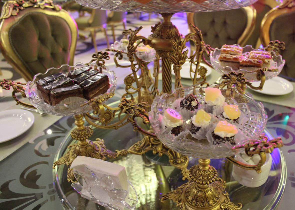 The female party starts with petit fours: they provide the much needed energy for the frantic dancing that will soon follow. The main meal will only be offered after the party has quieted down. Photo: Tacita Vero