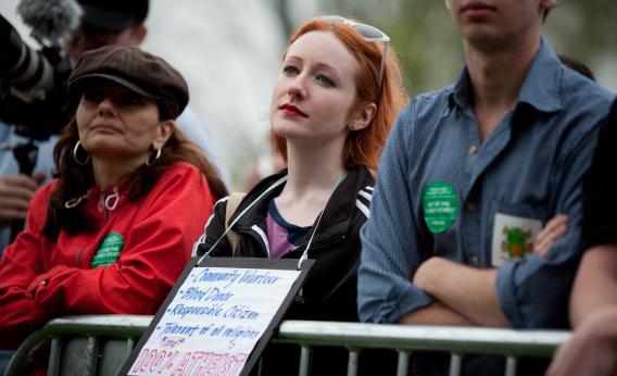 A woman listening to a speaker at the Reason Rally. But now women in the community want to do more than just listen.