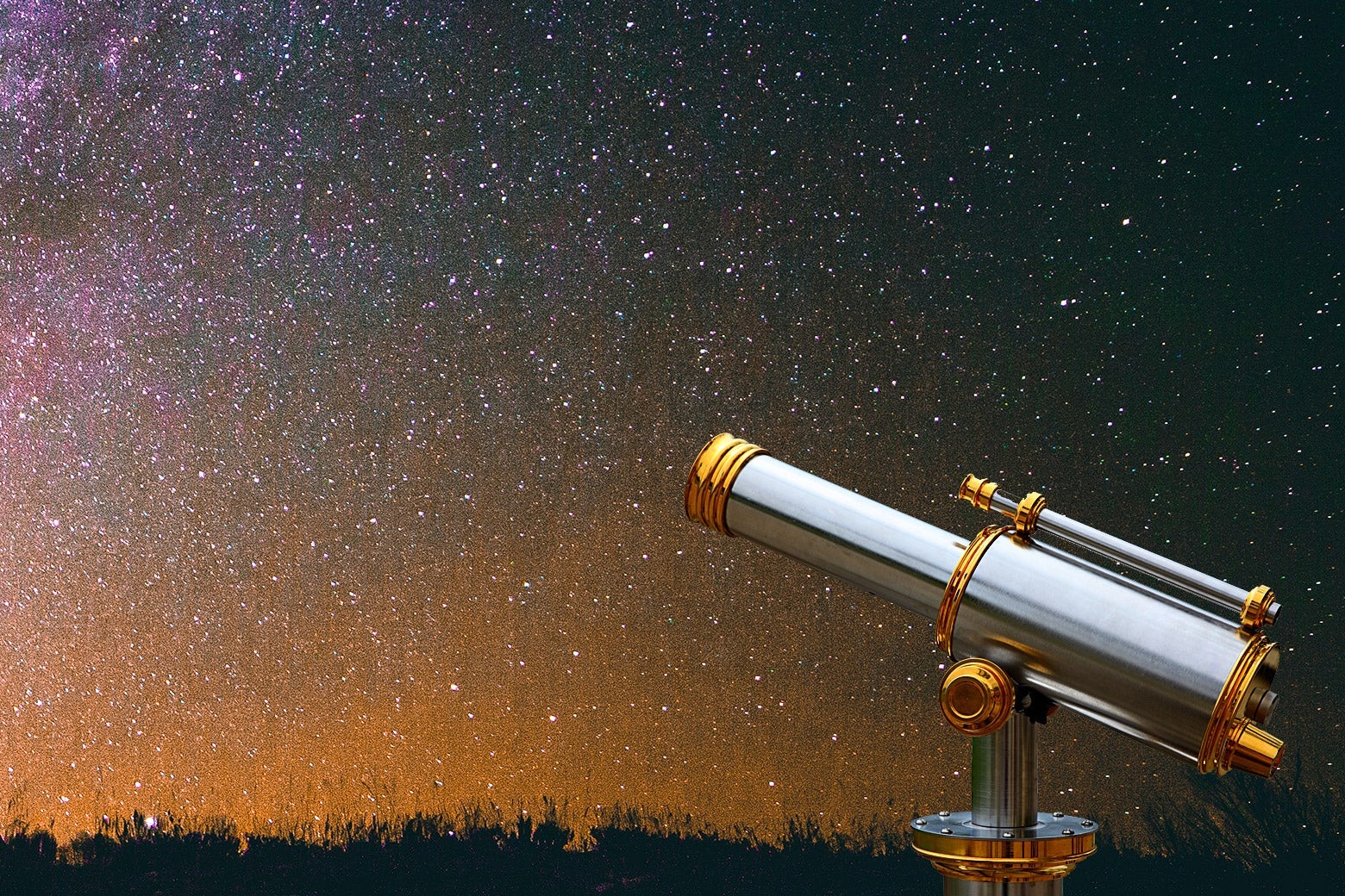 A telescope looking at a starry night sky.