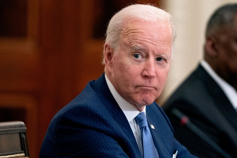 Joe Biden arches his eyebrows.