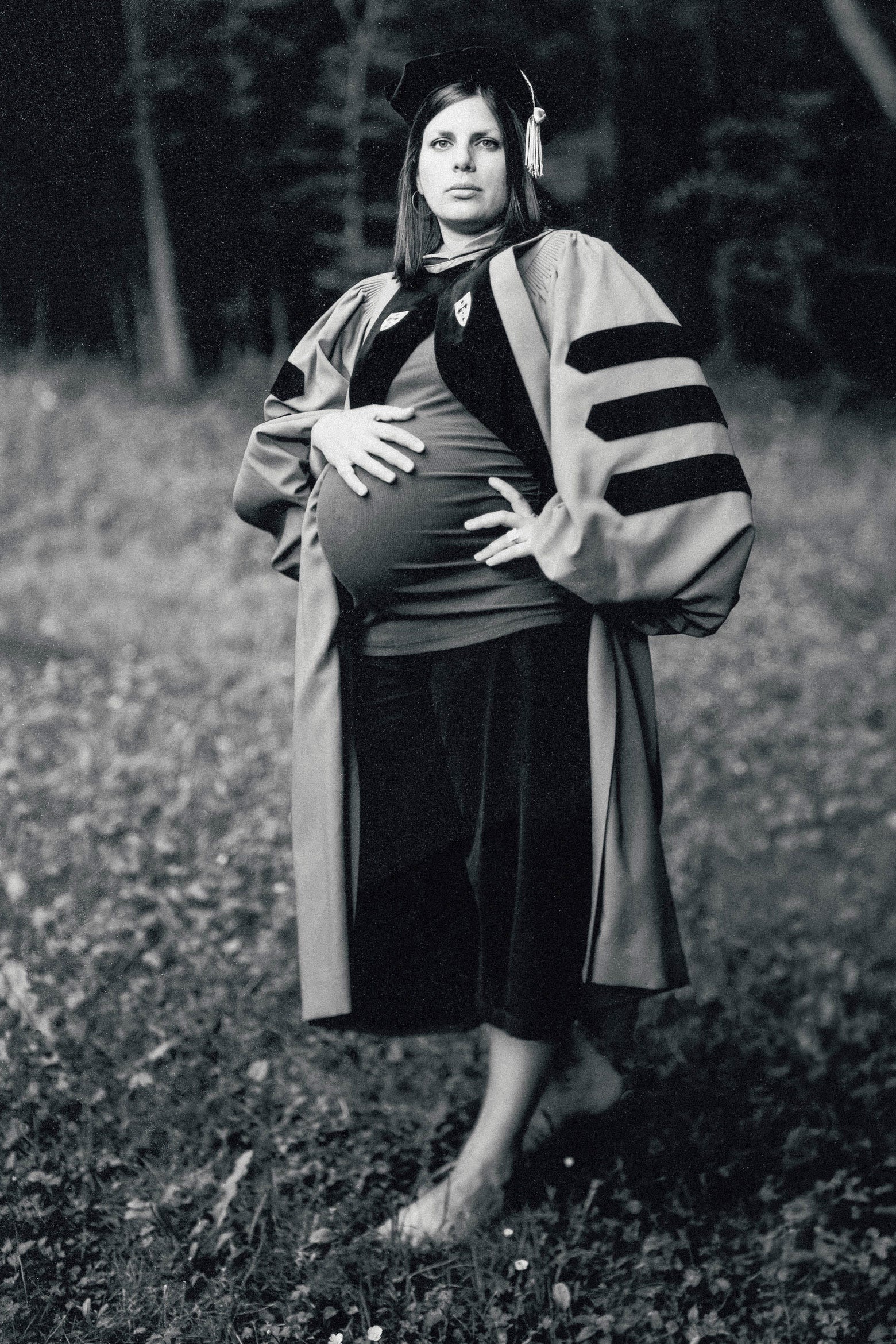 Julie poses in graduation regalia.