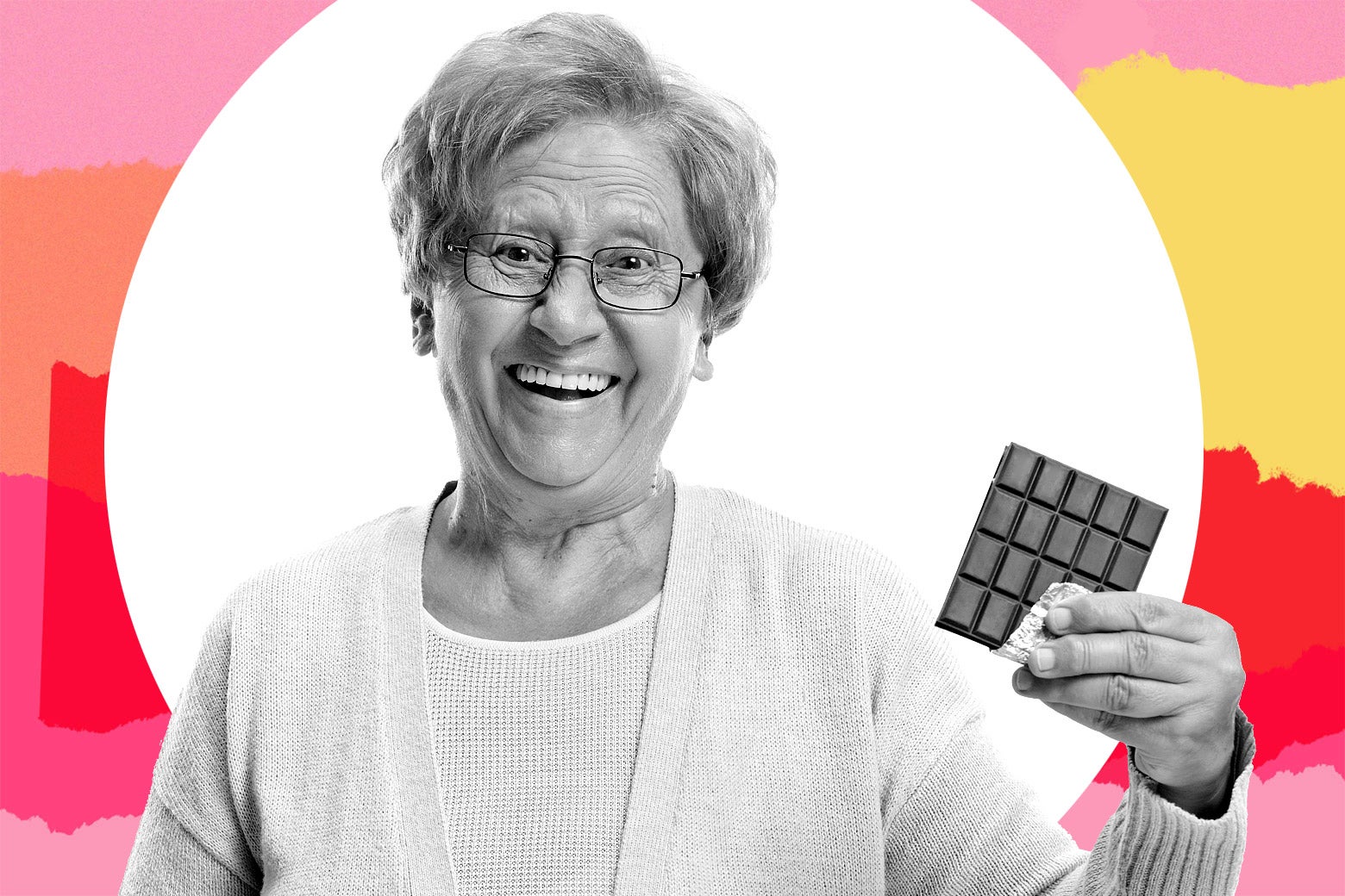 A grandmother holds up some chocolate.