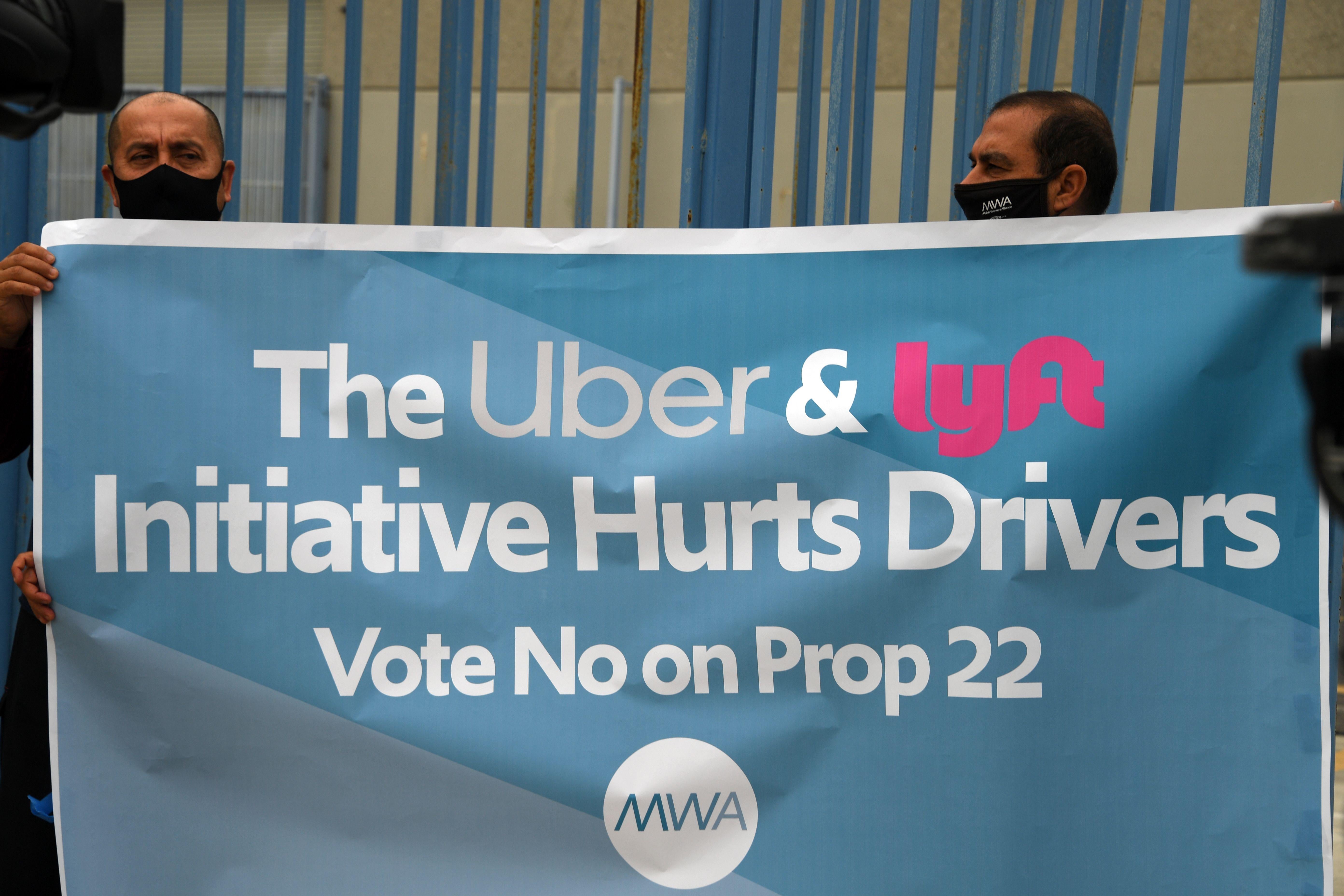 Ride-share drivers demonstrate against ride-share companies Uber and Lyft.