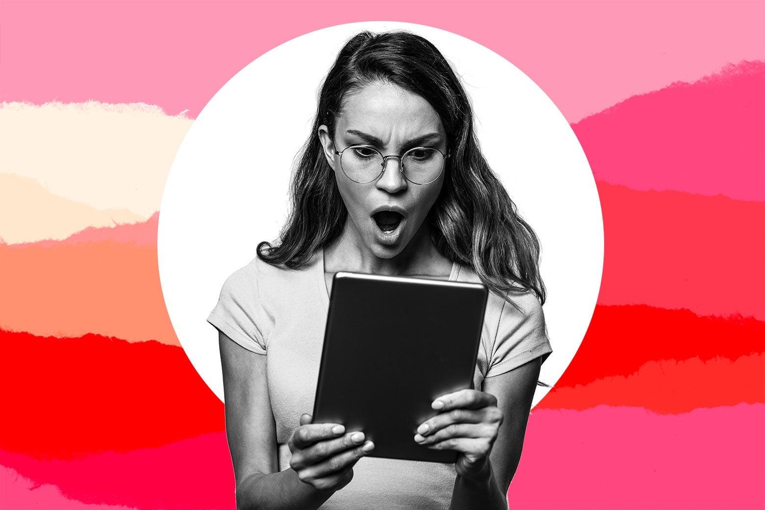 Woman with mouth agape looks shocked at what she's seeing on an iPad.