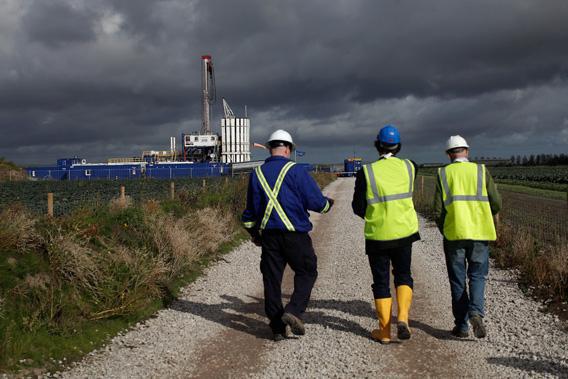 Engineers look at the Cuadrilla shale fracking facility on October 7, 2012 in Preston, Lancashire.