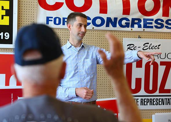 Rep. Tom Cotton looks for questions in a crowd of supporters at a Republican.