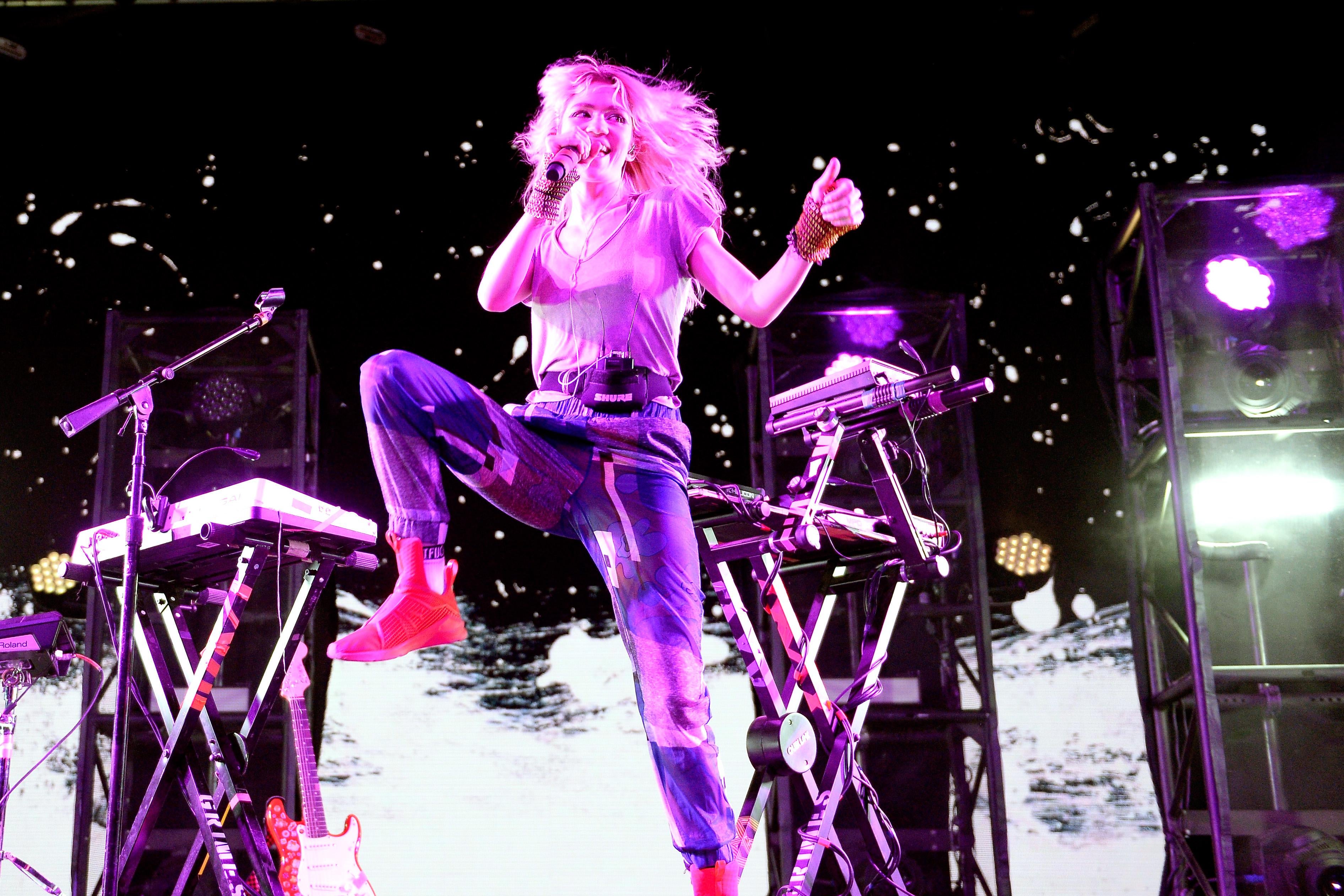 Grimes performs onstage at Coachella in 2016