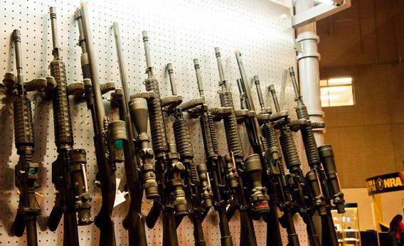 A wall of semi-automatic rifles is seen at the National Rifle Association.