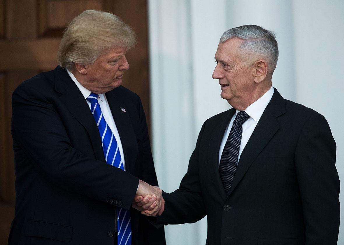 President-elect Donald Trump shakes hands with retired United States Marine Corps general James Mattis after their meeting at Trump International Golf Club, November 19, 2016 in Bedminster Township, New Jersey.