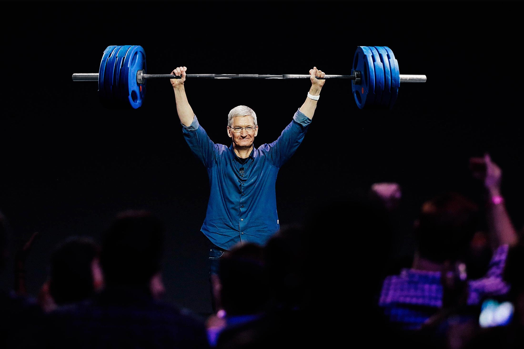 Photo illustration: Tim Cook lifting a barbell over his head at an Apple event.
