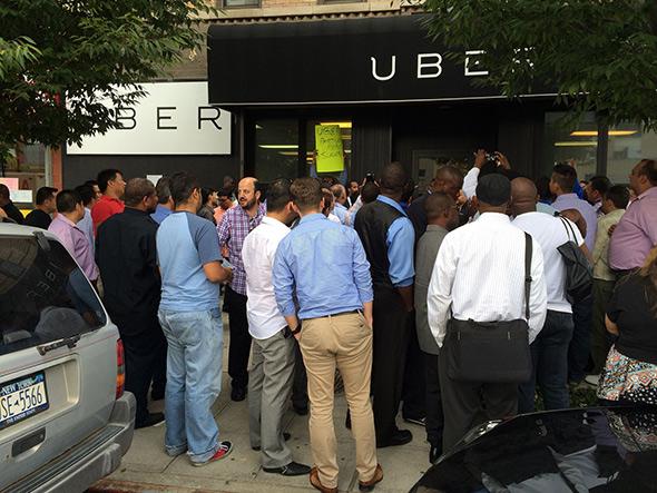 Drivers gather outside Uber’s New York City office to protest in September.