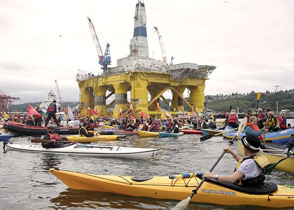 Kayactivists protest the Shell Oil Company's drilling rig Polar Pioneer which is parked at Terminal 5 at the Port of Seattle