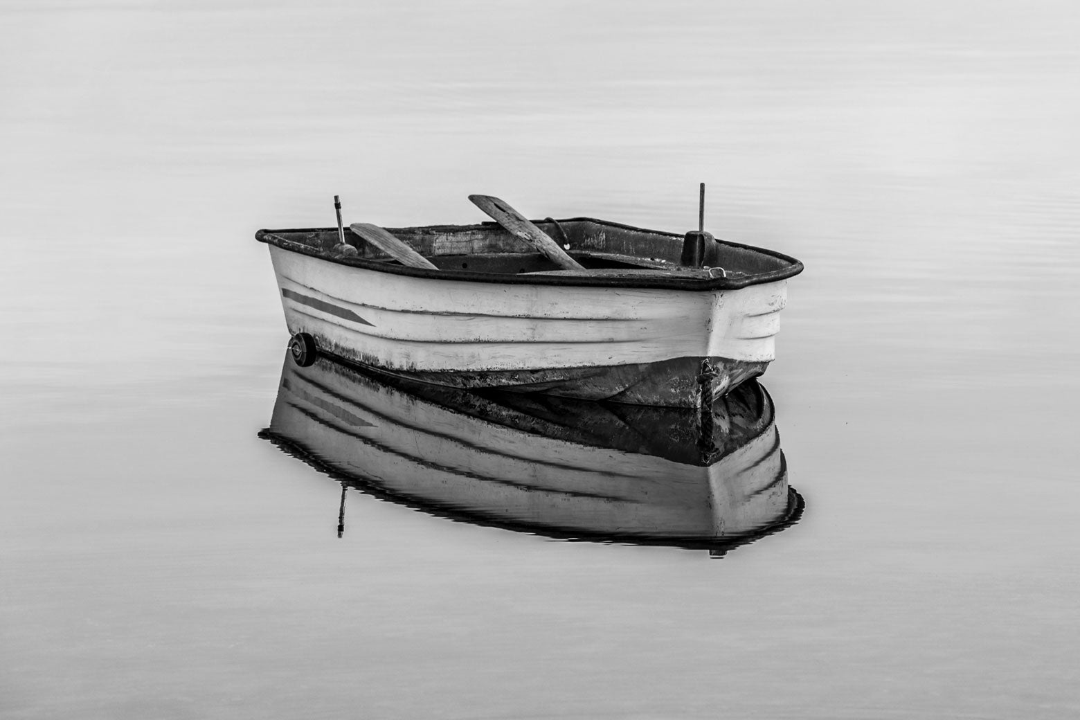 A row boat, in black and white.