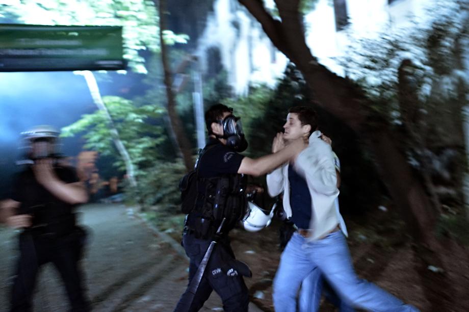 A riot policeman detains a demonstrator in Istanbul on June 4, 2013. 