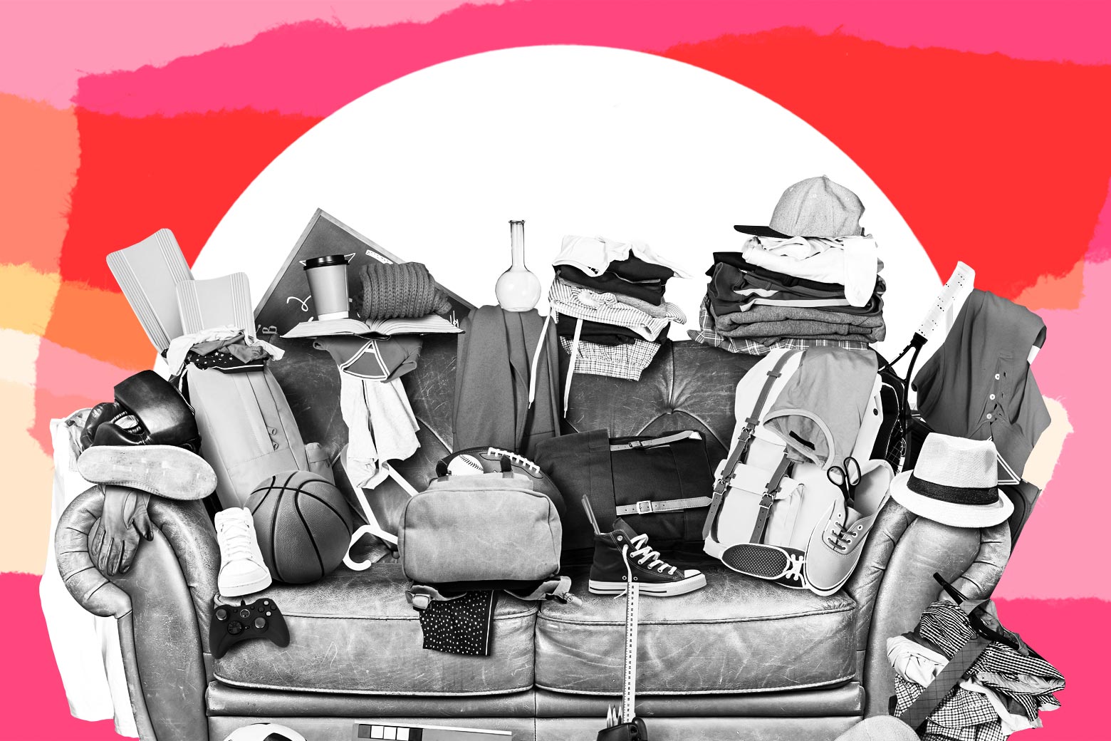 A couch with a variety of junk piled on top of it.