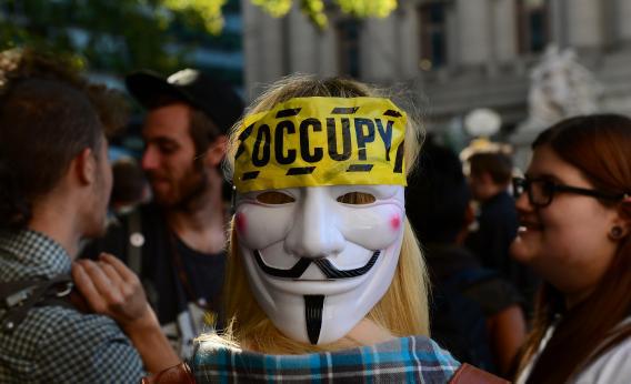Protesters affiliated with Occupy Wall Street march in the Financial District on Monday in New York City. 