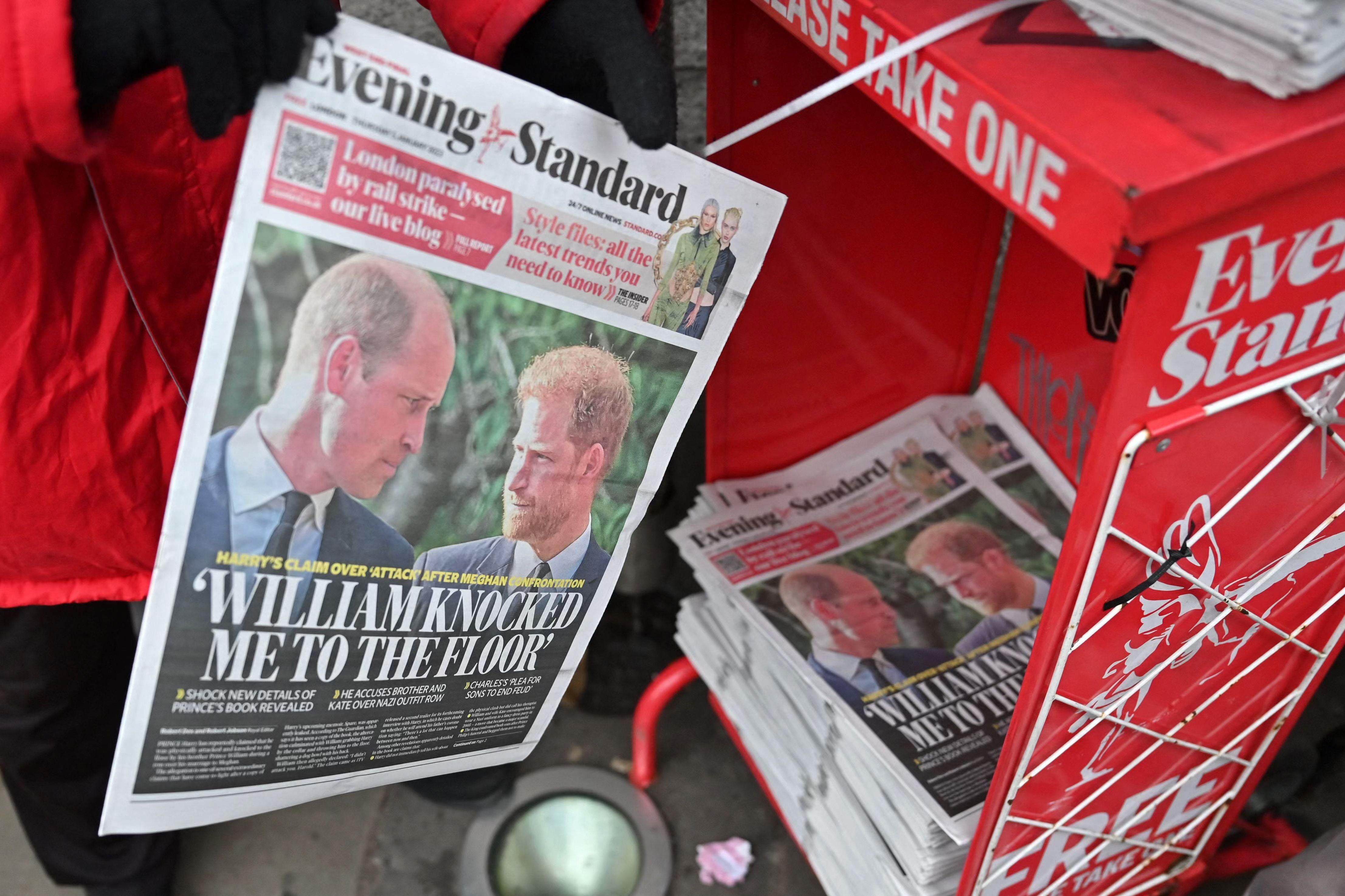 Copies of the Evening Standard newspaper, leading with stories about Britain's Prince Harry, Duke of Sussex's relationship with Britain's Prince William, Prince of Wales, are placed out for distribution, in London on January 5, 2023, ahead of the publication of Britain's Prince Harry, Duke of Sussex's book, Spare. - Britain's Prince Harry recounts in his new book how he was physically "attacked" by his older brother Prince William during an argument in 2019, the Guardian reported on January 4, 2023. (Photo by JUSTIN TALLIS / AFP) (Photo by JUSTIN TALLIS/AFP via Getty Images)