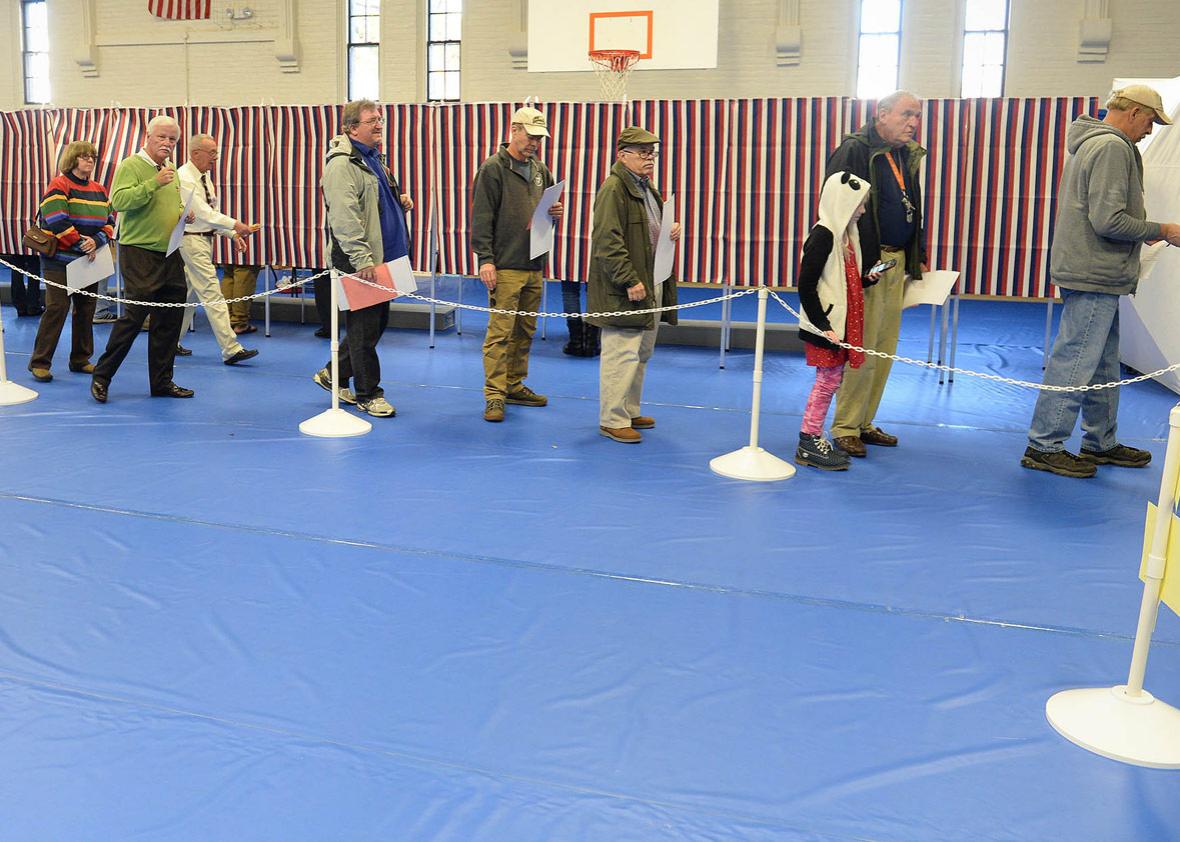 Voters line up to cast their ballots at the Green Street Community Center 