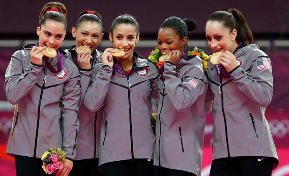 United States celebrate after winning the gold medal in the Artistic Gymnastics Women's Team.